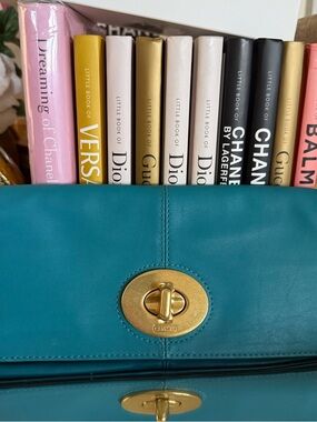 Coach Madison east west clutch, smooth,leather fold over turn lock teal blue